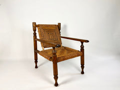 Rustic French armchair in wood and woven rope