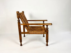 Rustic French armchair in wood and woven rope