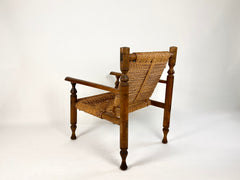 Rustic French armchair in wood and woven rope