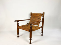 Rustic French armchair in wood and woven rope