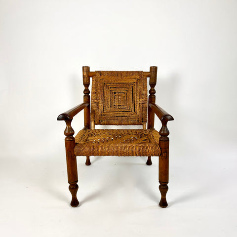 Rustic French armchair in wood and woven rope