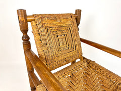 Rustic French armchair in wood and woven rope