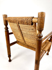 Rustic French armchair in wood and woven rope