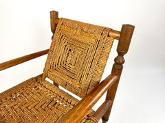 Rustic French armchair in wood and woven rope