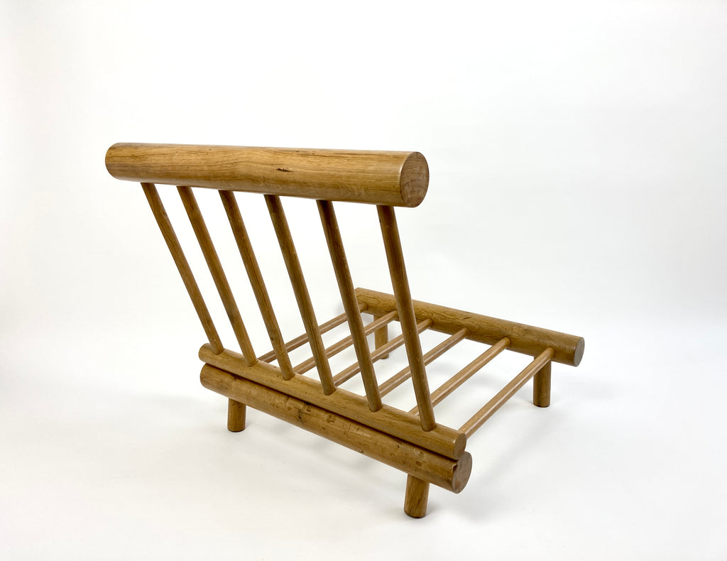 Charlotte Perriand - Low 'chauffeuse' (fireside) lounge chair in elm for  Les Arcs