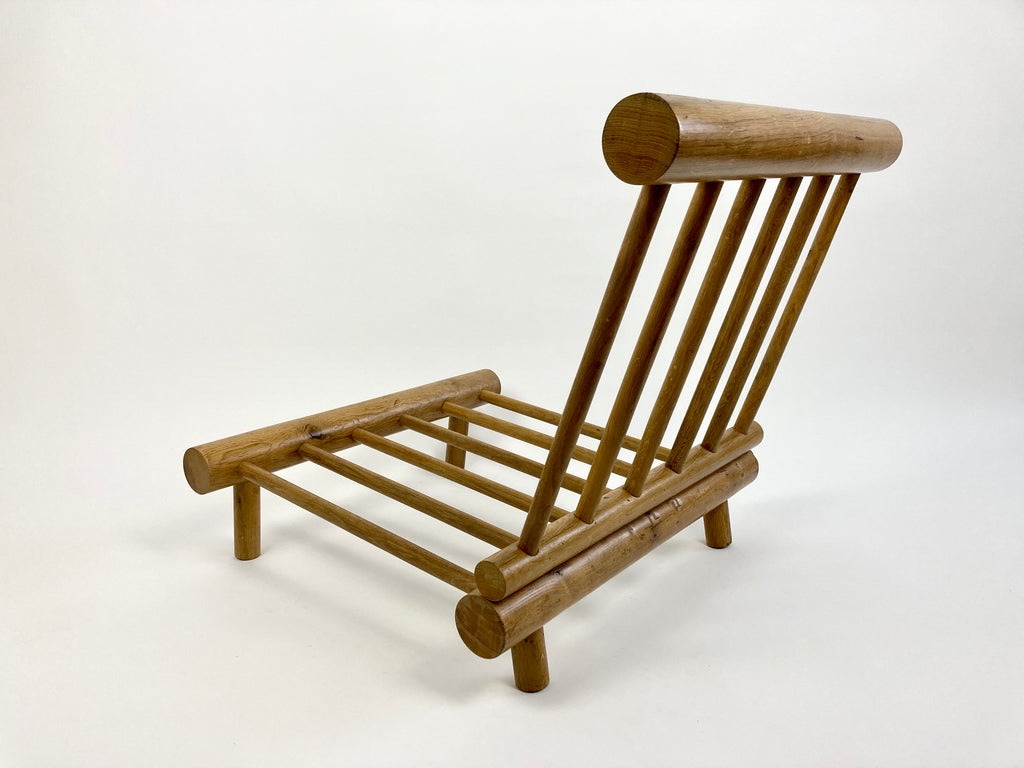 Charlotte Perriand - Low 'chauffeuse' (fireside) lounge chair in elm for  Les Arcs