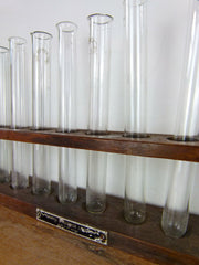 Vintage laboratory test tube rack and test tubes - eyespy